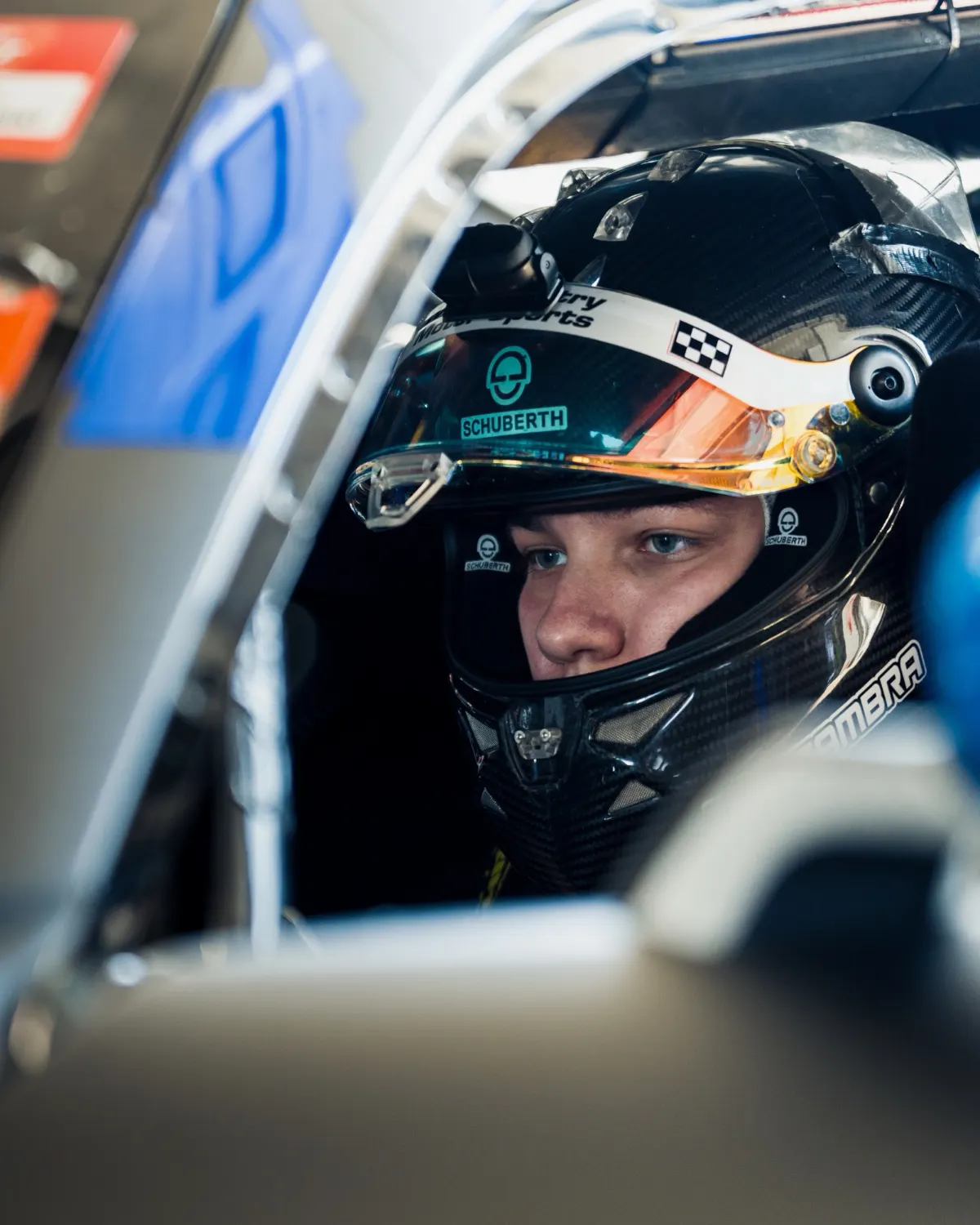 Siro Zambra in the car with the helmet on